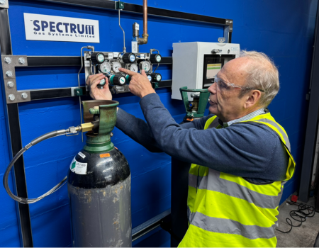 Man inspecting manifold system