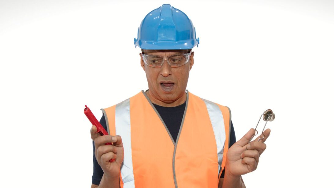 Man in high vis vest and blue hard hat
